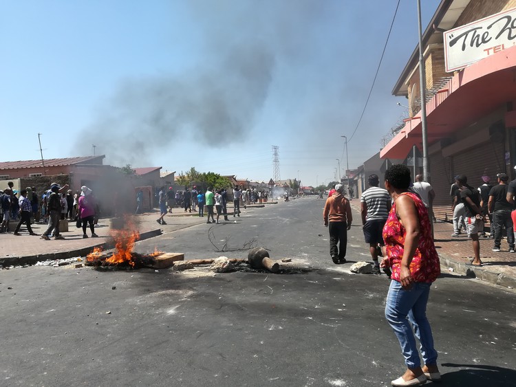 Photo of burning tyres in street