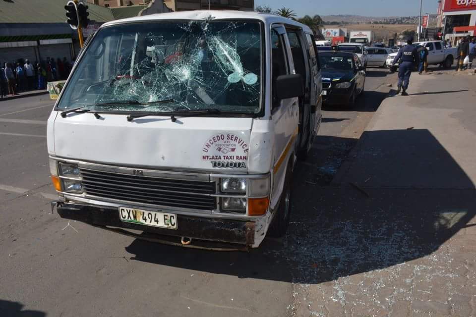 Photo of taxi with broken windscreen