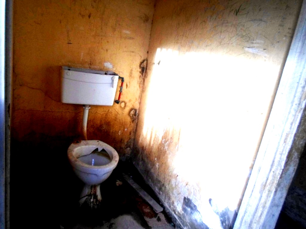Photo of a broken toilet