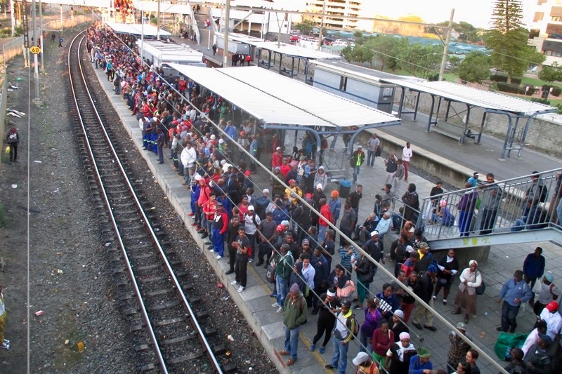 Photo of crowded train station platform