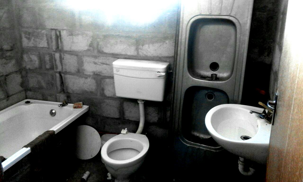 Photo of a dilapidated bathroom